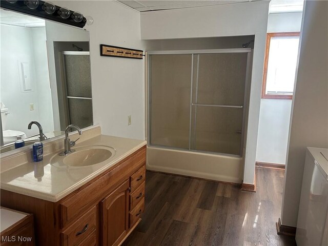 16535 State Route 60 S, Dresden, OH 43821 - bathroom featuring enclosed tub / shower combo, wood finished floors, and vanity