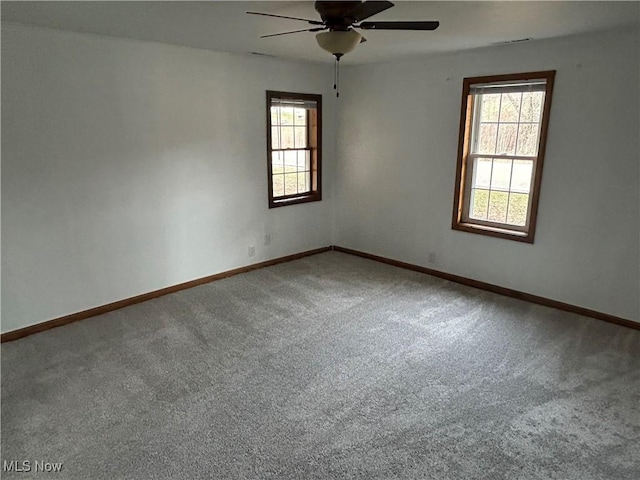 16535 State Route 60 S, Dresden, OH 43821 - spare room featuring baseboards, carpet, and ceiling fan