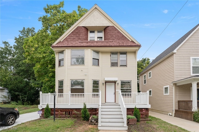 1344 E 112th St, Cleveland, OH 44106 - victorian-style house with roof with shingles