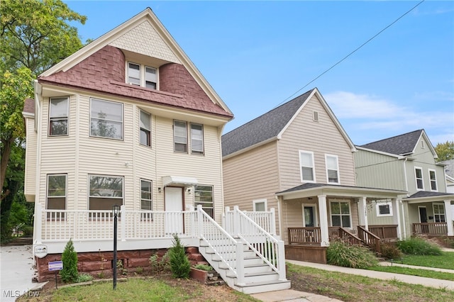 1344 E 112th St, Cleveland, OH 44106 - victorian-style house with covered porch