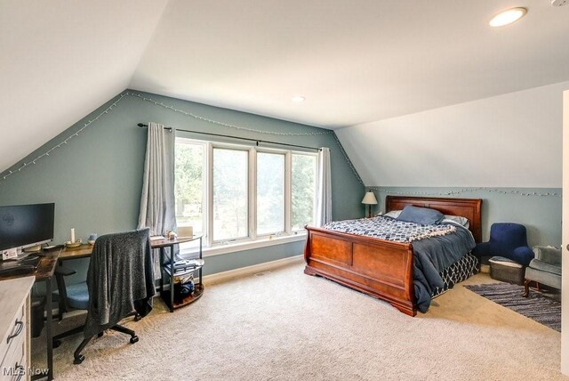 1581 E 118th St, Cleveland, OH 44106 - bedroom with recessed lighting, baseboards, lofted ceiling, and carpet floors