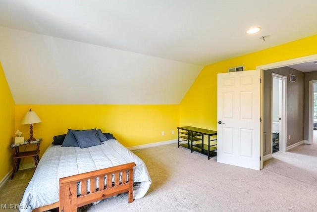 1581 E 118th St, Cleveland, OH 44106 - bedroom featuring visible vents, baseboards, light carpet, and vaulted ceiling