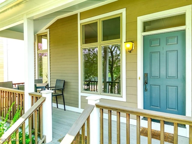 1581 E 118th St, Cleveland, OH 44106 - doorway to property featuring covered porch