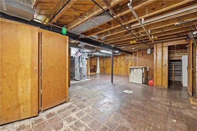 unfinished basement with heating unit