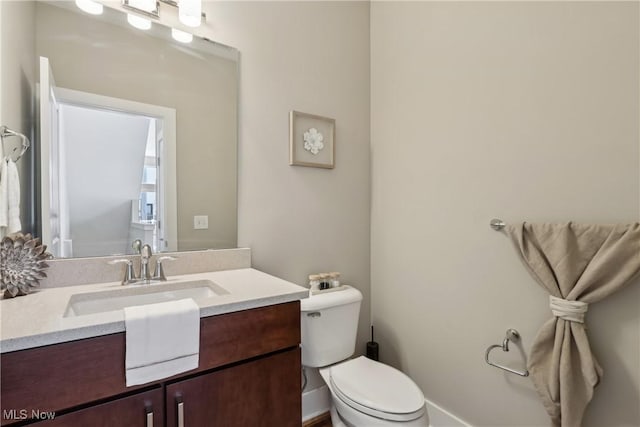 1228 W 74th St, Cleveland, OH 44102 - bathroom featuring vanity and toilet