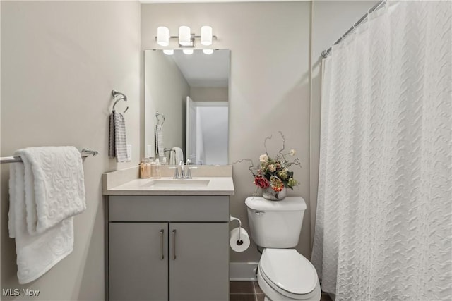 1228 W 74th St, Cleveland, OH 44102 - bathroom with curtained shower, baseboards, toilet, and vanity