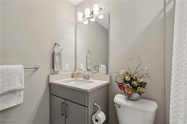 1228 W 74th St, Cleveland, OH 44102 - bathroom featuring toilet and vanity