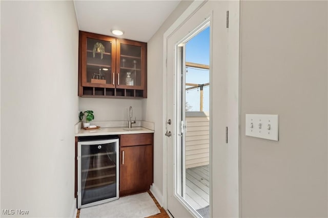 1228 W 74th St, Cleveland, OH 44102 - bar featuring wet bar, beverage cooler, and a sink