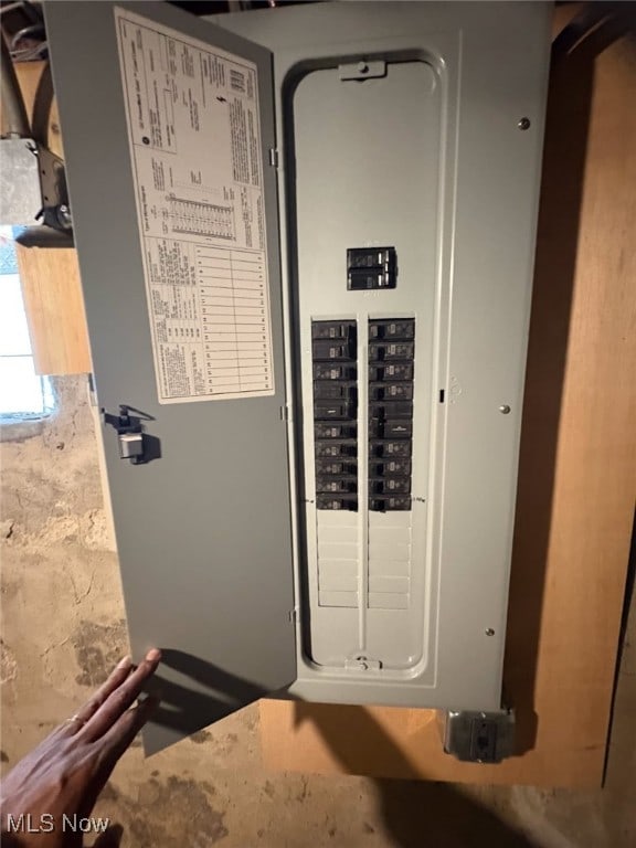 utility room featuring electric panel