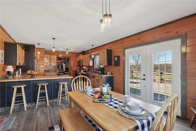 1525 Old Kyle Rd, Dorset, OH 44032 - dining room with wood walls and wood finished floors