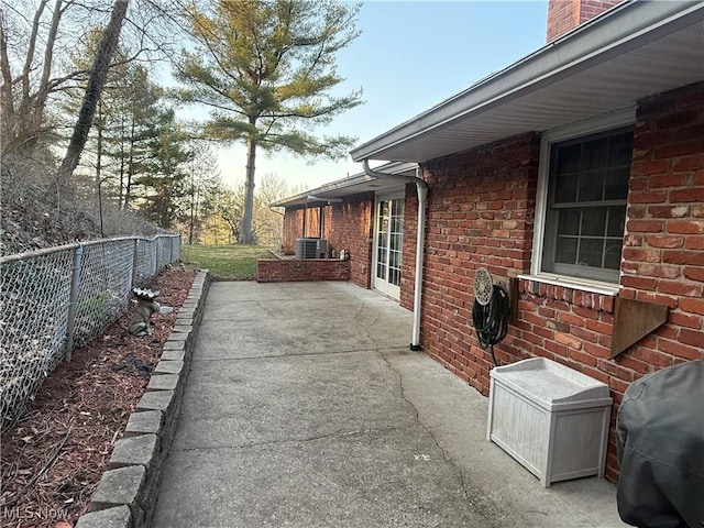 106 Wildwood Dr, Marietta, OH 45750 - view of patio with area for grilling, fence, and central AC