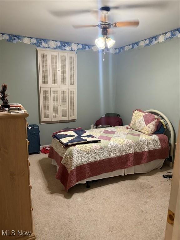 106 Wildwood Dr, Marietta, OH 45750 - bedroom featuring a ceiling fan and carpet flooring
