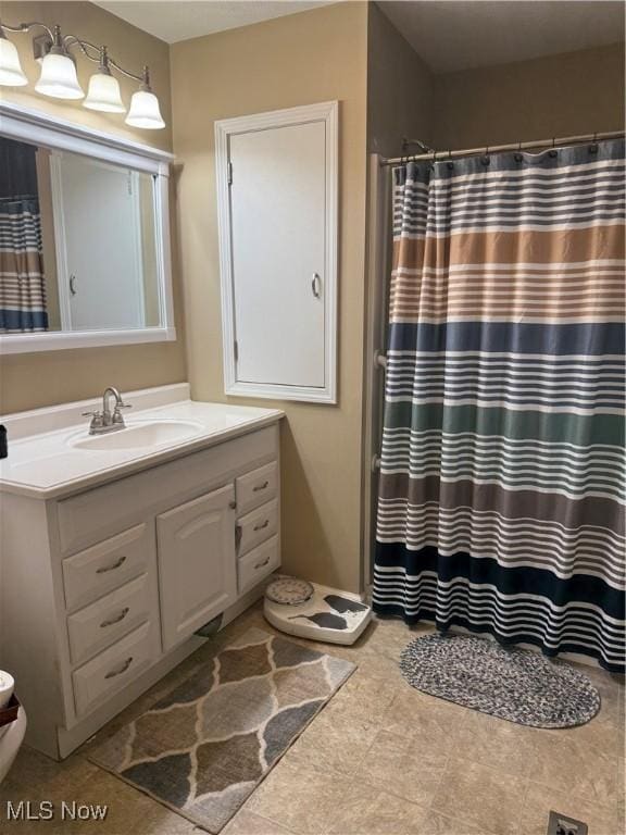 106 Wildwood Dr, Marietta, OH 45750 - bathroom featuring vanity, curtained shower, and toilet