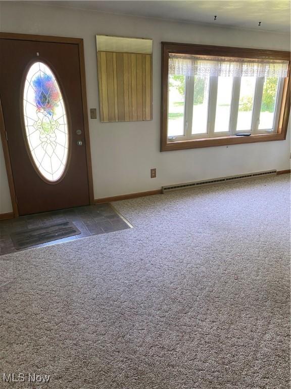 30173 Georgetown Rd, Salem, OH 44460 - carpeted foyer with plenty of natural light, baseboard heating, and baseboards