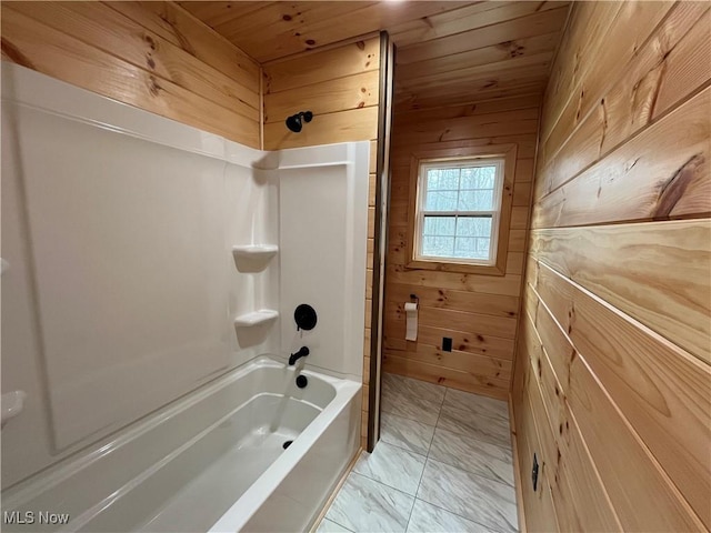 2239 Eureka Rd, Ashtabula, OH 44004 - bathroom featuring tub / shower combination, wood ceiling, wood walls, and marble finish floor