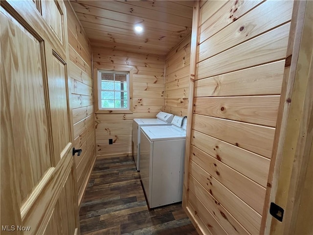 2239 Eureka Rd, Ashtabula, OH 44004 - washroom with washing machine and clothes dryer, laundry area, wood walls, dark wood finished floors, and wooden ceiling