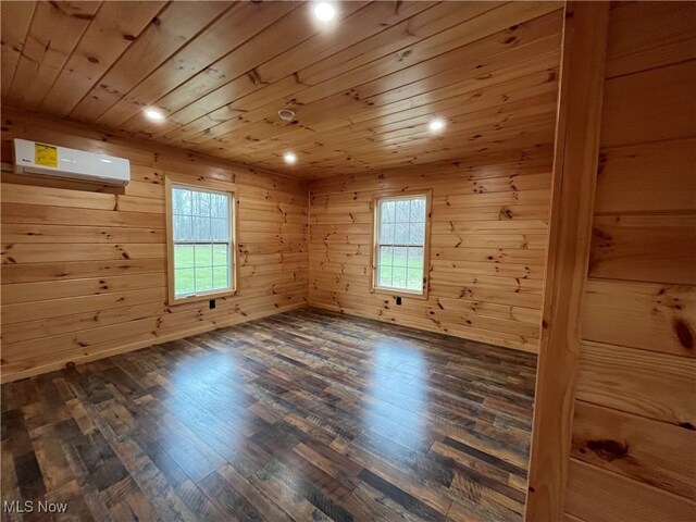 2239 Eureka Rd, Ashtabula, OH 44004 - unfurnished room featuring wood walls, a wall unit AC, wood finished floors, and wooden ceiling
