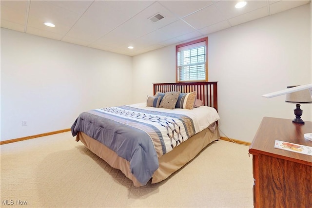 carpeted bedroom with visible vents, recessed lighting, baseboards, and a drop ceiling