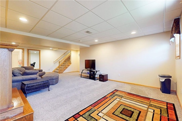 living area featuring visible vents, baseboards, carpet, stairway, and recessed lighting