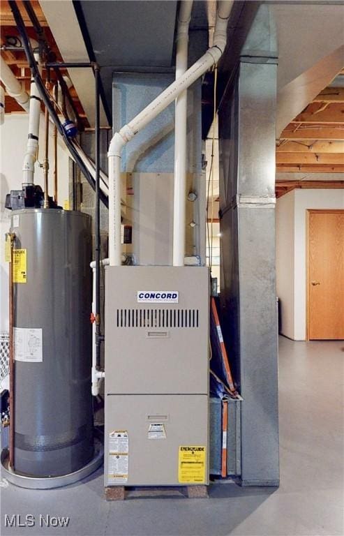 utility room with water heater