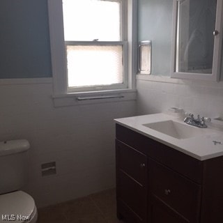 1033 Rushleigh Rd, Cleveland Heights, OH 44121 - bathroom featuring toilet and vanity
