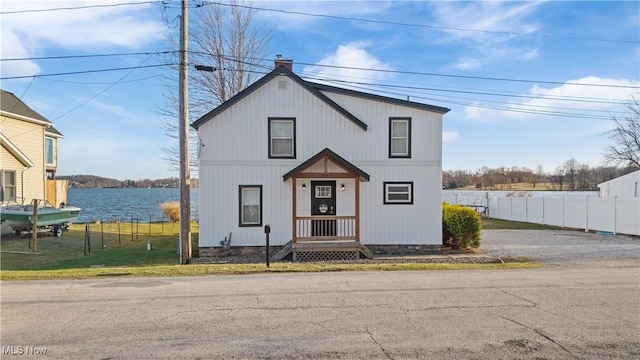 2326 Canfield Rd, Akron, OH 44312 - modern farmhouse style home with fence and a water view