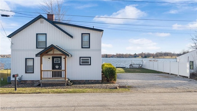 2326 Canfield Rd, Akron, OH 44312 - modern inspired farmhouse featuring fence, a water view, and a chimney