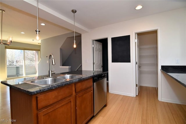 1261 W 74, Cleveland, OH 44102 - kitchen with a sink, dishwasher, light wood-style floors, brown cabinetry, and a center island with sink