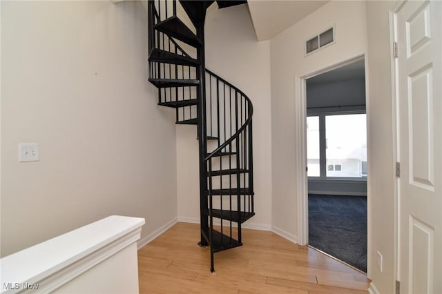 1261 W 74, Cleveland, OH 44102 - stairway featuring wood finished floors and baseboards