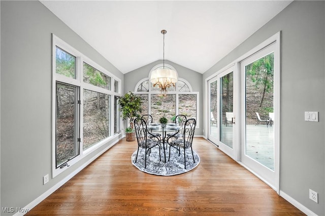 4100 Chagrin River Rd, Moreland Hills, OH 44022 - sunroom featuring plenty of natural light, a chandelier, and vaulted ceiling