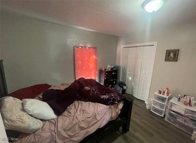 3782 W 38th St, Cleveland, OH 44109 - bedroom featuring dark wood-style floors and a closet