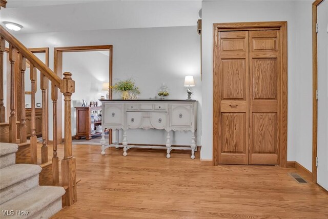 9620 Bimeler St NE, Bolivar, OH 44612 - interior space with light wood finished floors, visible vents, and stairs