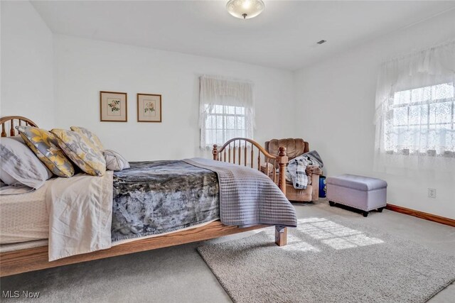 9620 Bimeler St NE, Bolivar, OH 44612 - bedroom featuring carpet flooring and baseboards