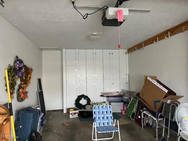 garage featuring a garage door opener