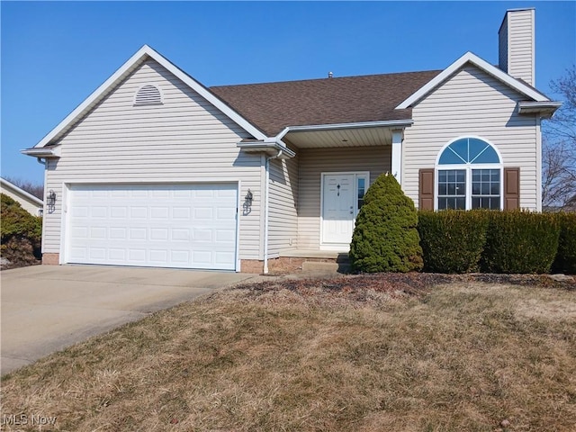 single story home featuring an attached garage, driveway, and a chimney