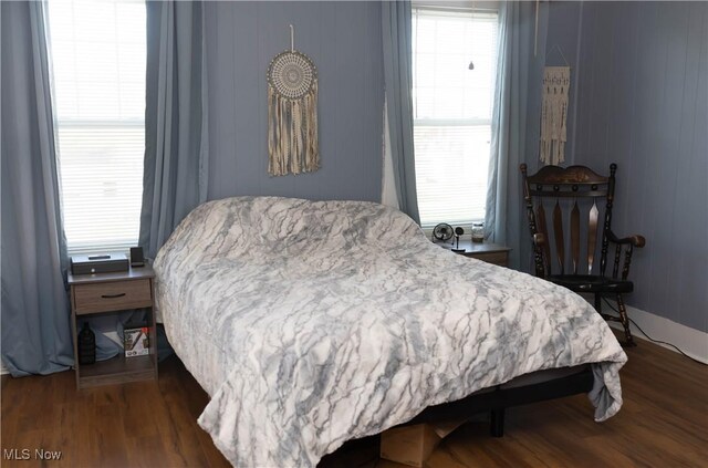 212 E Church St, Warsaw, OH 43844 - bedroom featuring wood finished floors