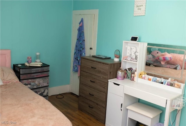 212 E Church St, Warsaw, OH 43844 - bedroom featuring dark wood finished floors