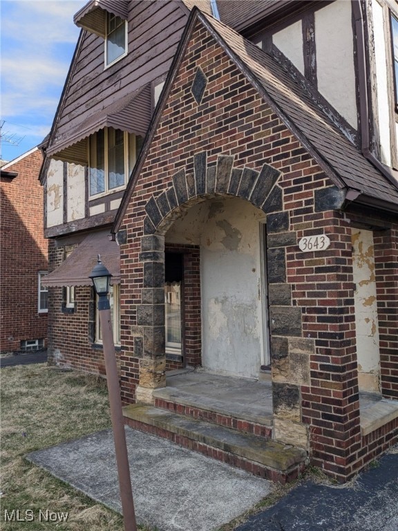 3643 Lindholm Rd, Shaker Heights, OH 44120 - property entrance featuring brick siding