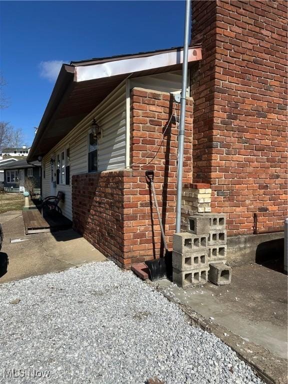 167 Andover Rd, Woodsfield, OH 43793 - view of property exterior with brick siding