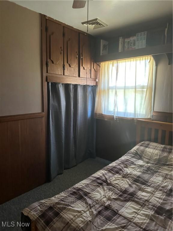 167 Andover Rd, Woodsfield, OH 43793 - bedroom featuring carpet and wainscoting
