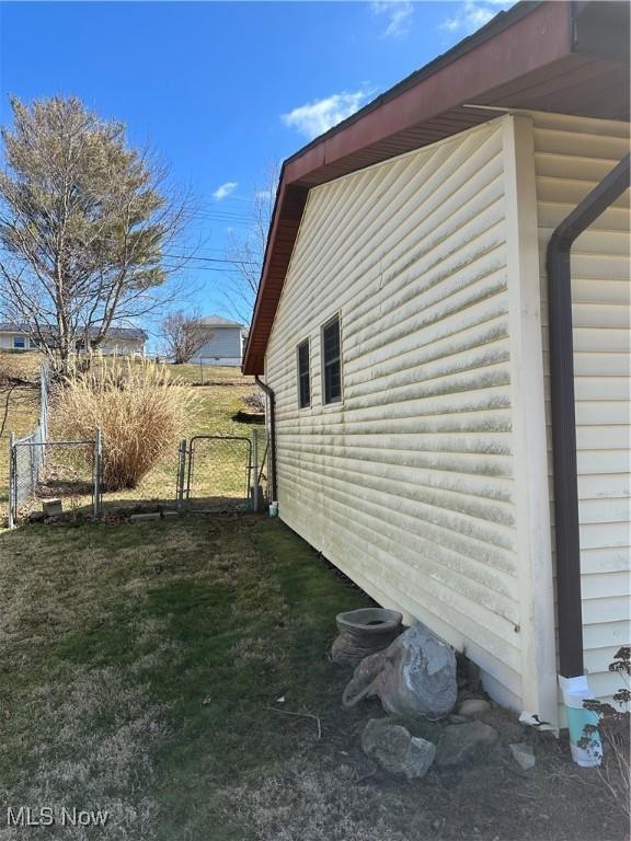167 Andover Rd, Woodsfield, OH 43793 - view of side of property with a gate