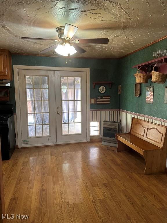 167 Andover Rd, Woodsfield, OH 43793 - entryway with french doors, a ceiling fan, light wood finished floors, and heating unit