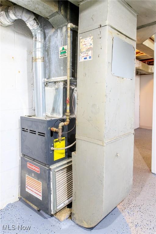 15921 Cloverside Ave, Cleveland, OH 44128 - utility room featuring heating unit