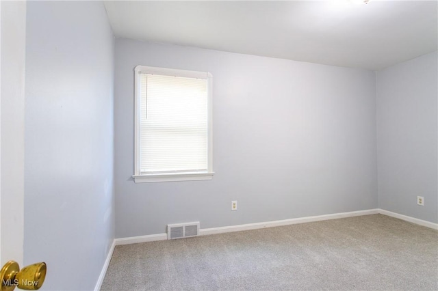 15921 Cloverside Ave, Cleveland, OH 44128 - unfurnished room featuring visible vents, carpet floors, and baseboards