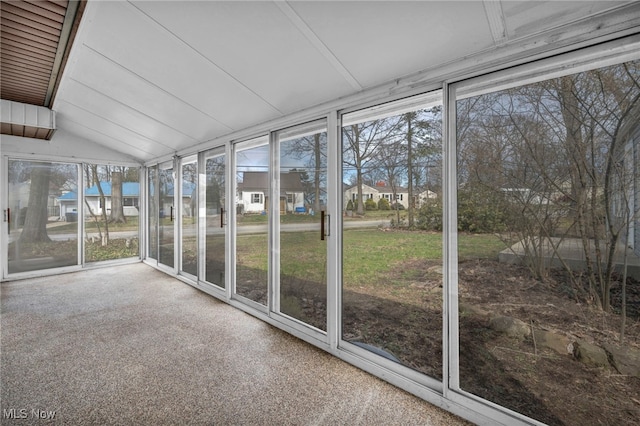 unfurnished sunroom featuring plenty of natural light