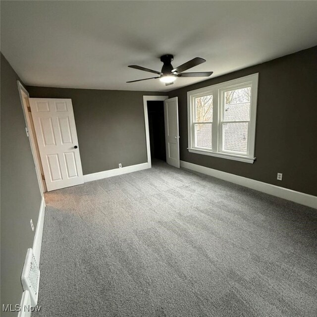 163 The Brooklands, Akron, OH 44305 - unfurnished bedroom featuring baseboards, a ceiling fan, carpet floors, and a closet