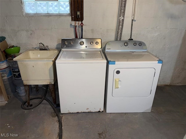 163 The Brooklands, Akron, OH 44305 - washroom with washing machine and clothes dryer, a sink, and concrete block wall
