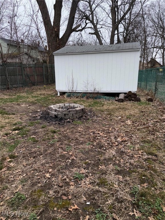 163 The Brooklands, Akron, OH 44305 - view of shed with an outdoor fire pit