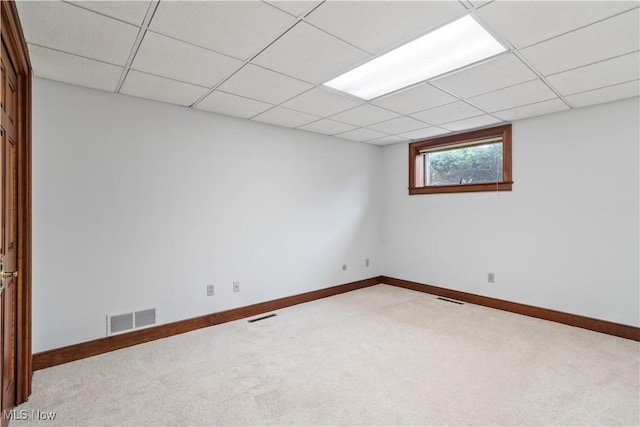 8187 N Lima Rd, Poland, OH 44514 - basement featuring carpet floors, a drop ceiling, and baseboards