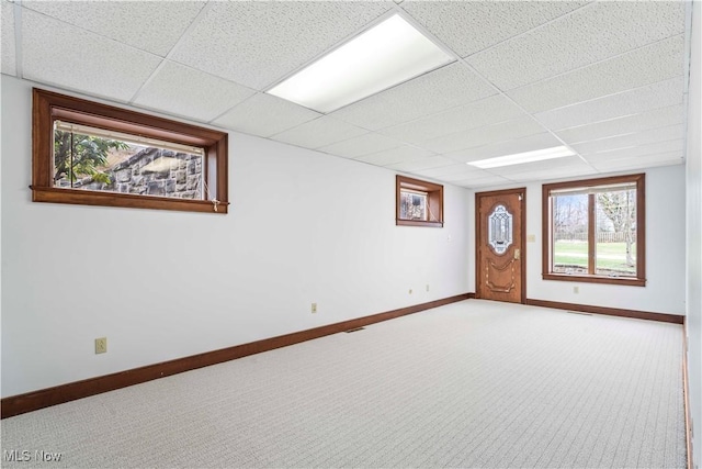 8187 N Lima Rd, Poland, OH 44514 - empty room with a drop ceiling, baseboards, and carpet